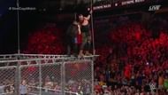 Image result for braun strowman throws kevin owens off a steel cage